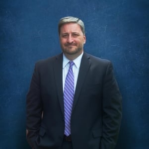 AARON E. CONNOR