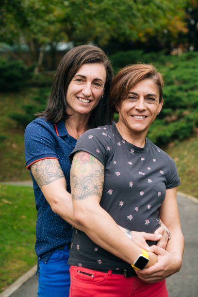 Same-sex couple holding each other