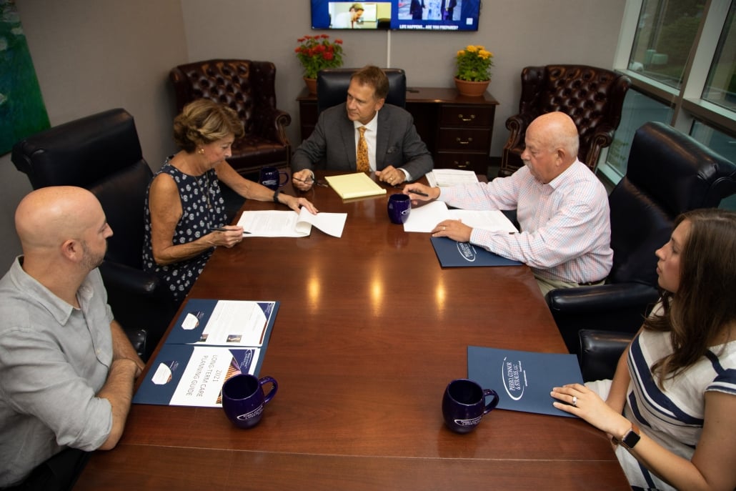 Albany Estate Planning attorneys collaborate in their home office with a client